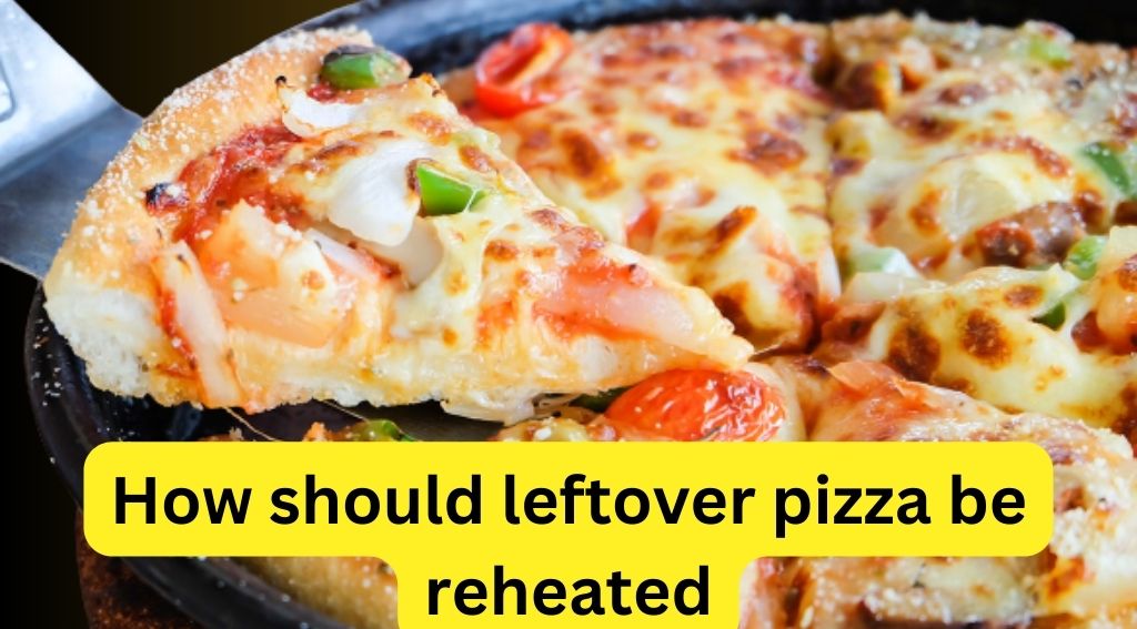 How should leftover pizza be reheated